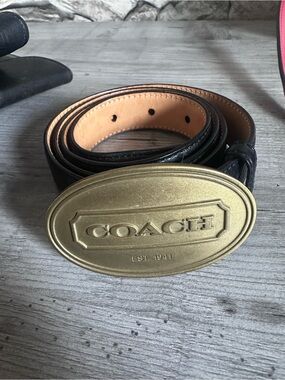 COACH Black Leather Belt with Brass Oval Logo Buckle